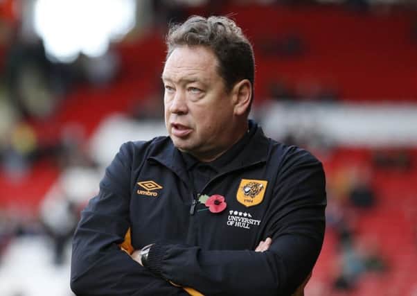 Hull City manager Leonid Slutsky took training yesterday as usual at their Cottingham base.