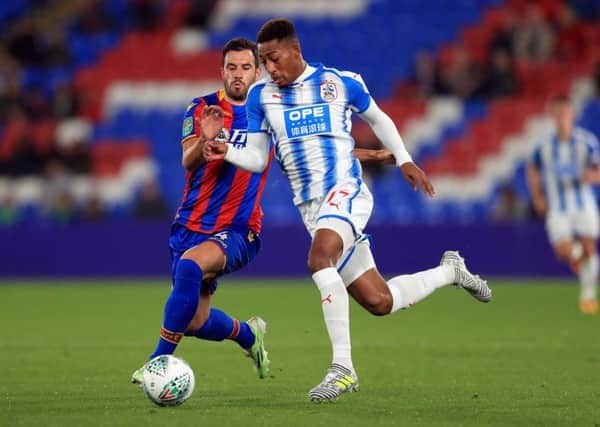 Huddersfield Town's Rajiv van La Parra, right, has apologised to his team-mates for his behaviour on Saturday. (Picture: PA)