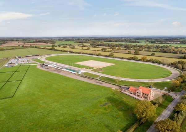 York Harness Raceway comes with over 100 acres, stables, a menage and a house.