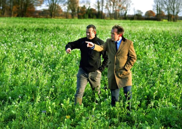 Farming Minister George Eustice (right) with farmer Richard Bramley at Manor Farm in Kelfield near York. Pictures by Gary Longbottom.