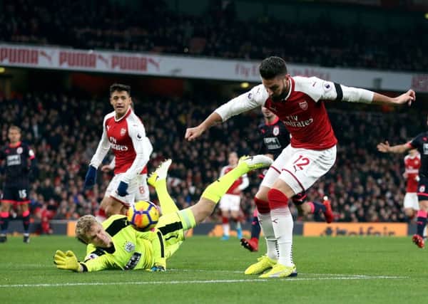 Arsenal's Olivier Giroud attempts a shot on goal.