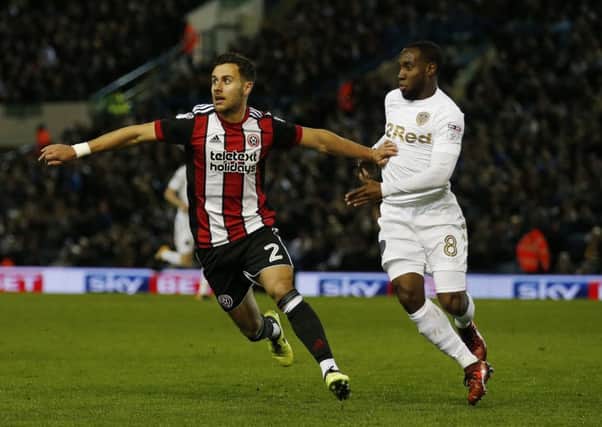 BACK IN THE FRAME: Sheffield United's George Baldoc holds off Vurnon Anita at Elland Road last month. Picture: Simon Bellis/Sportimage