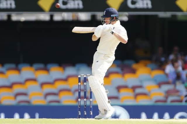 MOVE ON UP: England's Jonny Bairstow, seen holing out to former Yorkshire team-mate Peter Handscomb (hidden) on day four at The Gabba, should be batting no lower than No 5, says Chris Waters. Picture: Jason O'Brien/PA