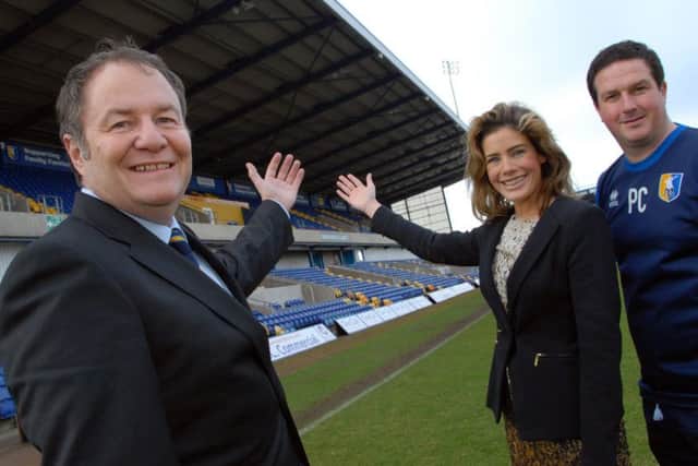 Then Mansfield boss Paul Cox with chairman John Radford, and chief exec Carolyn Stills