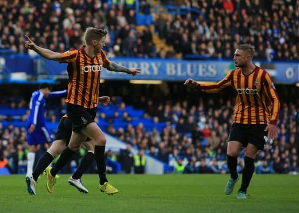 Bradford City's Jonathan Stead (left) celebrates scoring his sides first goal of the game during the FA Cup Fourth Round match at Stamford Bridge, London. (Picture: John Walton/PA Wire)