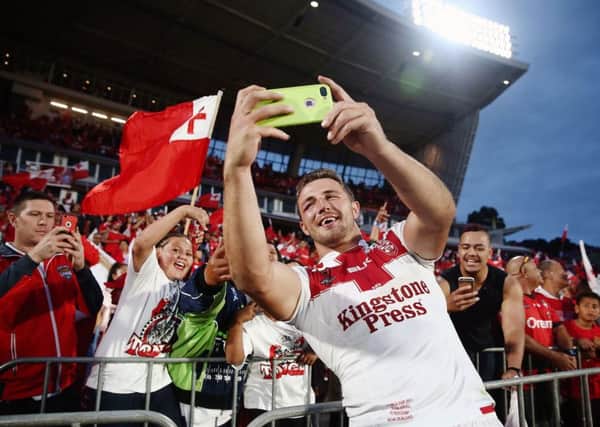 Sam Burgess takes a selfie with fans after England's World Cup semi-final win over Tomga (Picture: Andrew Cornaga/SWpix.com/PhotosportNZ).