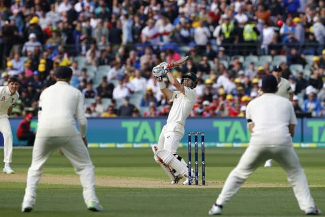 Australia's David Warner attempts a shot over the slips during day one of the Ashes Test match at Adelaide. Picture: Jason O'Brien/PA