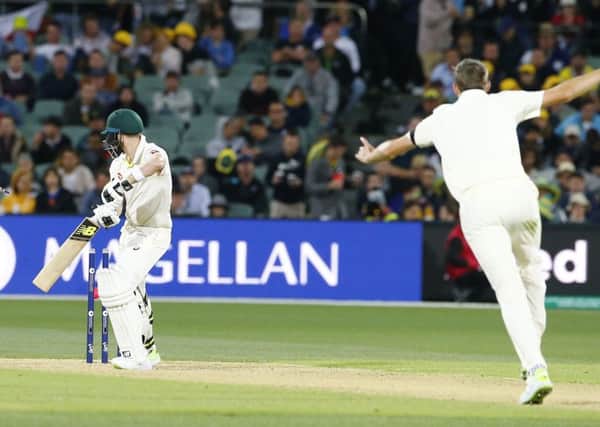 GOT HIM: England's Craig Overton takes the prized wicket of Australia captain Steve Smith on a tense day one of the Ashes Test match at the Adelaide Oval. Picture: Jason O'Brien/PA