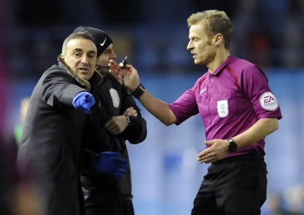 Referee Michael Jones sends off Owls boss Carlos Carvalhal.....Pic Steve Ellis