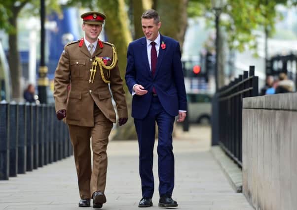 Scarborough-born Gavin Williamson (right) outside the Ministry of Defence in London after he was named as the new Secretary of State for Defence following the resignation of Sir Michael Fallon who admitted his behaviour had "fallen below the high standards required" in the role.