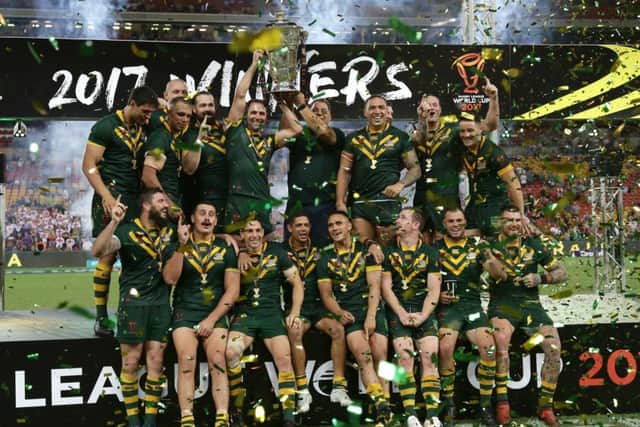 Australia celebrate after winning the Rugby League World Cup final against England at the Suncorp Stadium in Brisbane. Picture: Tertius Pickard/SWpix.com/PhotosportNZ