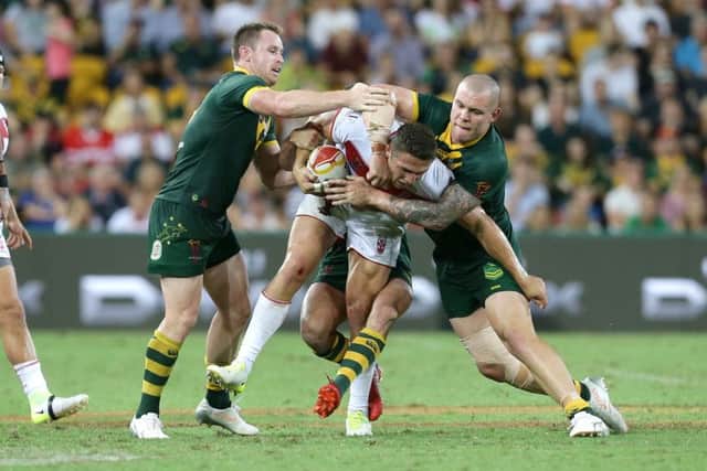 SOLID LINE: England's Samuel Burgess attacks during the Rugby League World Cup final against Australia. Picture: Tertius Pickard/SWpix.com/PhotosportNZ