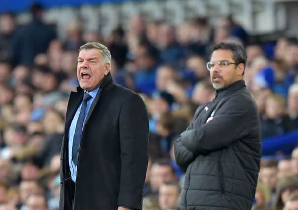 TOUGH DAY: Huddersfield Town boss, David Wagner, stands close to opposite number Sam Allardyce during Saturday's 2-0 loss at Goodison Park. Picture: Dave Howarth/PA