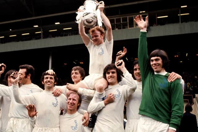 Leeds United captain Billy Bremner celebrates winning the FA Cup in 1972 with his Leeds team-mates. Picture: PA