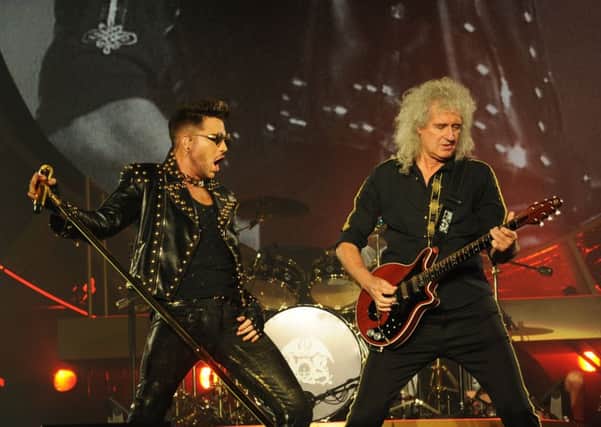 Adam Lambert with Brian May of Queen.