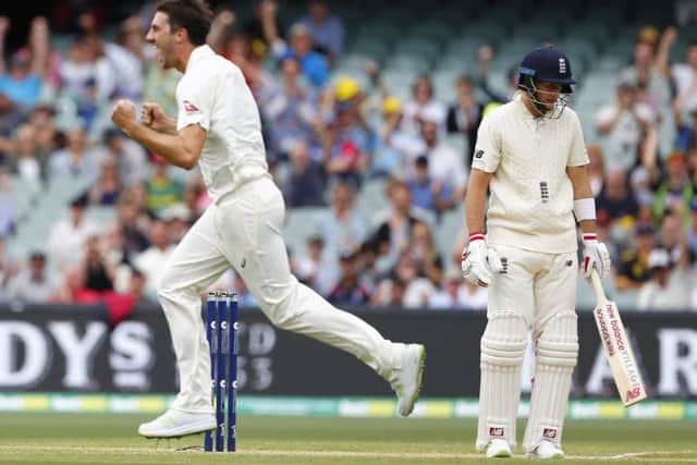 ON YOUR WAY: England's Joe Root shows his dismay after Australia's Pat Cummins takes his wicket on day three at the Adelaide Oval. Picture: Jason O'Brien/PA