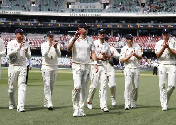 WELL PLAYED: England's James Anderson walks off after taking five wickets  on day four of the Ashes Test match at the  Adelaide Oval Picture: Jason O'Brien/PA