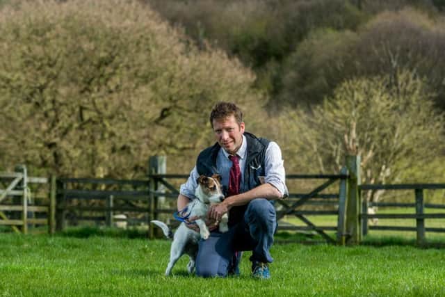 Julian Norton, co-star of The Yorkshire Vet, pictured with his Jack Russell, Emmy. Picture by James Hardisty.