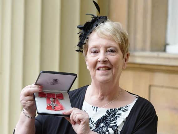 Sandra Major with her Member of the British Empire (MBE) medal. Picture: John Stillwell/PA Wire