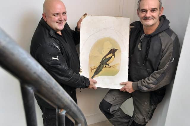 The Magpie restoration nears completion after the fire devastated the property.  Paul Gildroy with Site Project Manager Paul Wignall with one of the original works. Picture by Richard Ponter 175412e