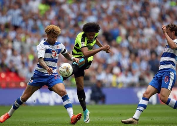 Izzy Brown goes for goal during Huddersfield Towns Wembley play-off meeting with Reading last May (Picture: PA).