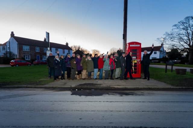 The grand reopening of the red phone box at Atwick , near Hornsea