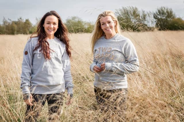 Dressage riders Abi Hutton, left, and Cara Hayward wear Huff Equestrian HonestRiders sweatshirts, with Â£5 form the sale of each going to the horse charities World Horse Welfare and Retraining of racehorses.