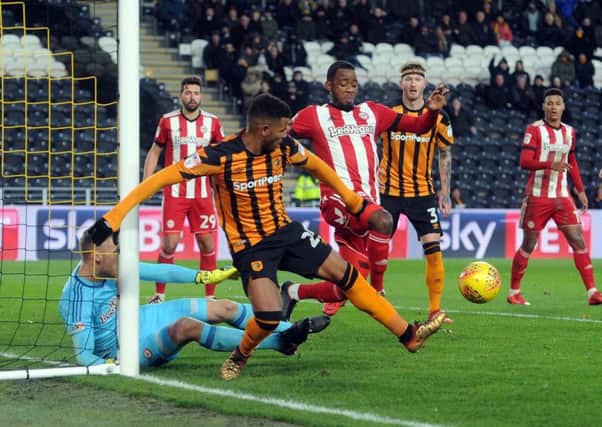 Brentford scramble the ball away from Tigers' Fraizer Campbell. Picture Tony Johnson.