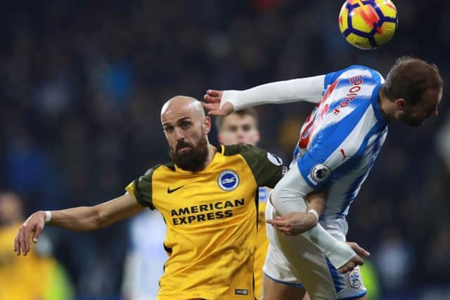 Brighton & Hove Albion's Bruno (left) and Huddersfield Town's Laurent Depoitre (Picture: Mike Egerton/PA Wire)