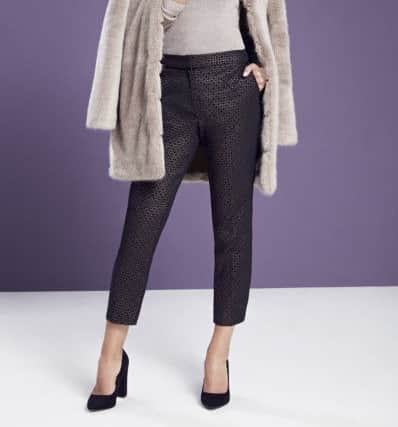 Mink fur midi coat, Â£80; trousers and top, from a selection, all at Wallis.