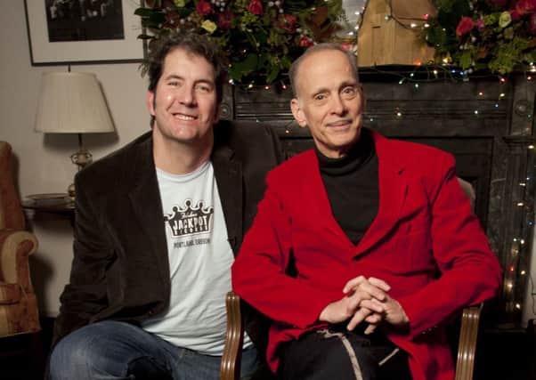 Mitchell Kezin with veteran film director John Waters. Picture: Jeff Henschel