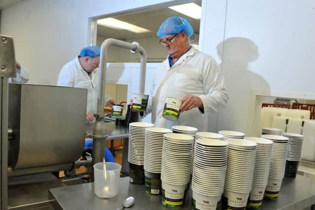 Production manager John Adamson filling the pots of Yorkshire Ice Cream made at Brymor Ice Cream at High Jervaulx Farm near Masham.  Picture Tony Johnson.