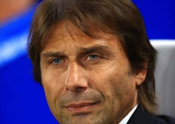 Antonio Conte: Chelsea manager feels the title is beyond reach for the champions.