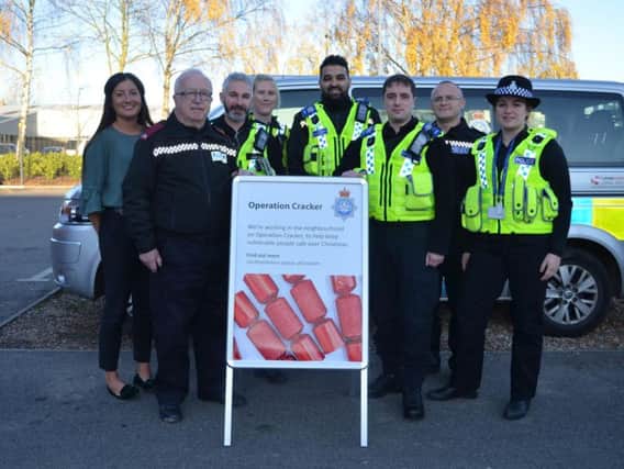 Police Support Volunteer Antony Baldwin (second left) and Inspector Lee Pointon (second right) with officers and staff from York Outer Neighbourhood Policing Team.