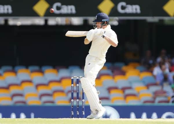 England's Jonny Bairstow hits a shot that is caught in the deep by Peter Handscomb during day four of the Ashes Test match at The Gabba, Brisbane. (Pictures: Jason O'Brien/PA Wire)
