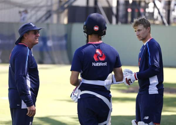 England's captain Joe Root, right, talks with coach Trevor Bayliss, left, and Moeen Ali during a nets session at the WACA Ground, Perth on Tuesday (Picture: Jason O'Brien/PA Wire).