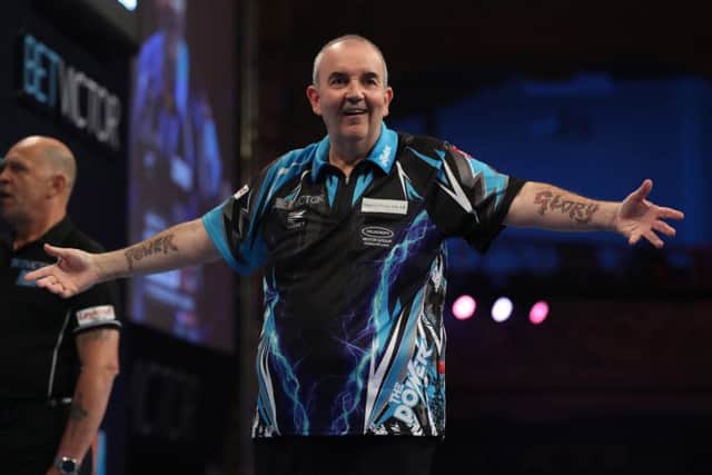 16-times champion Phil Taylor, inset, will retire after the tournament. (Picture: Lawrence Lustig)
