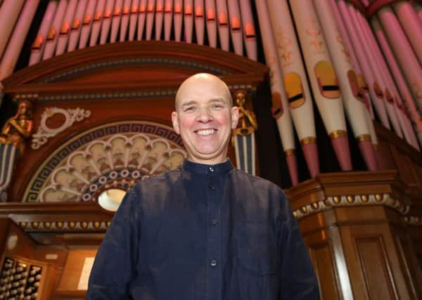 FESTIVE MUSIC: Organist Gordon Stewart plays at Huddersfield Town Hall.