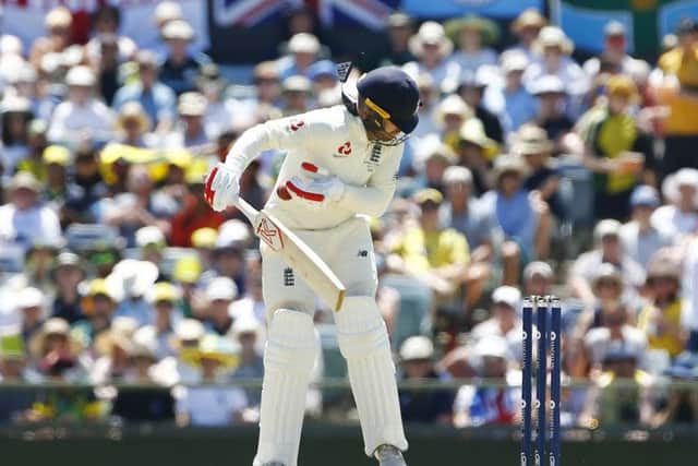 England's Mark Stoneman is hit by a bouncer at the WACA. Picture: Jason O'Brien/PA