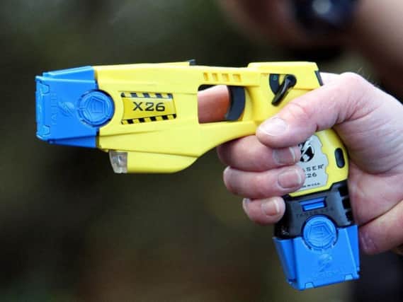 A taser was among the items found in the raid.