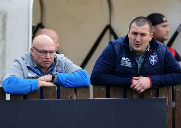 SEPARATE WAYS: Wakefield's former director of rugby John Kear, left, has taken over as head coach at Bradford Bulls, to the surprise of Trinity head coach Chris Chester.
 Picture: Jonathan Gawthorpe.