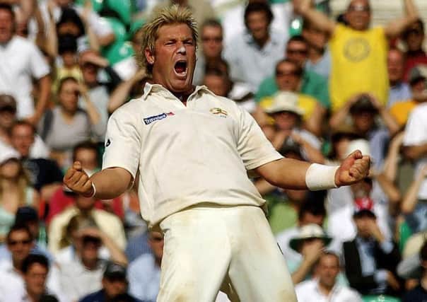Australia's Shane Warne as he celebrates taking England's Andrew Flintoff's wicket in 2005 (Picture: PA)