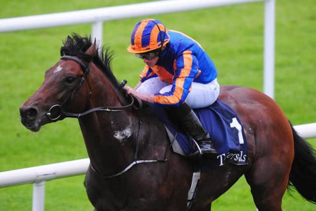 Churchill ridden by Ryan Moore win the Tattersalls Irish 2,000 Guineas at the Curragh Racecourse, Dublin. 2017.
