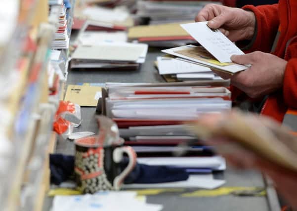 A Royal Mail sorting office as concerns grow that Christmas cards have become a tradition of the past. Do you agree with Andrew Vine that the age of the letter is dead?