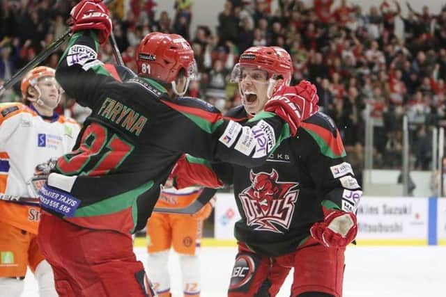 Cardiff Devils' players celebrate one of their four goals against Sheffield Steelers on Saturday night. Picture courtesy of Helen Brabon/EIHL.