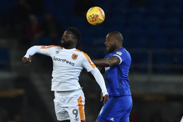 Cardiff City's Sol Bamba (right) and Hull City's Nouha Dicko battle for the ball. Picture: Simon Galloway/PA