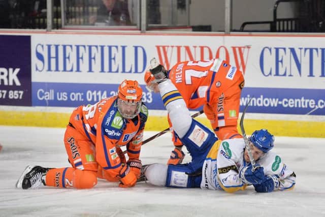 HELLO AGAIN: Zack Fitzgerald takes a tumble on Sunday night against Fife Flyers on a weekend which saw him return to action after three weeks out. Picture: Dean Woolley.