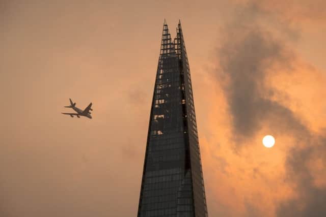 Review of the Year 2017: October: A plane flies past the Shard in central London  PRESS ASSOCIATION Photo