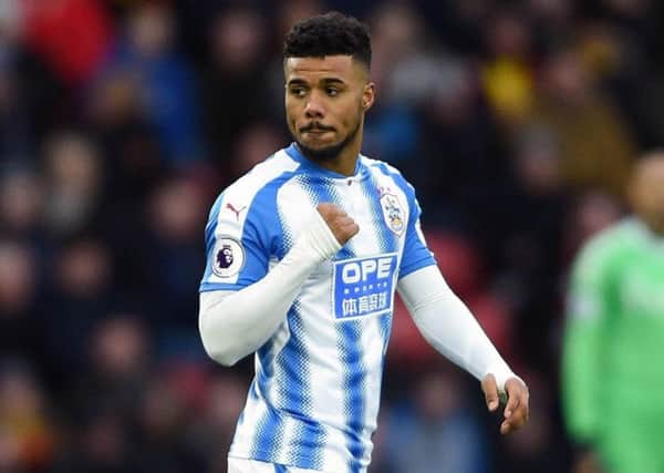 Huddersfield Town's Elias Kachunga celebrates scoring his side's first goal of the game during the Premier League match at Vicarage Road, Watford. (Pictures: Daniel Hambury/PA Wire)