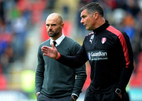 Rotherham's manager Paul Warne with assistant Richie Barker.